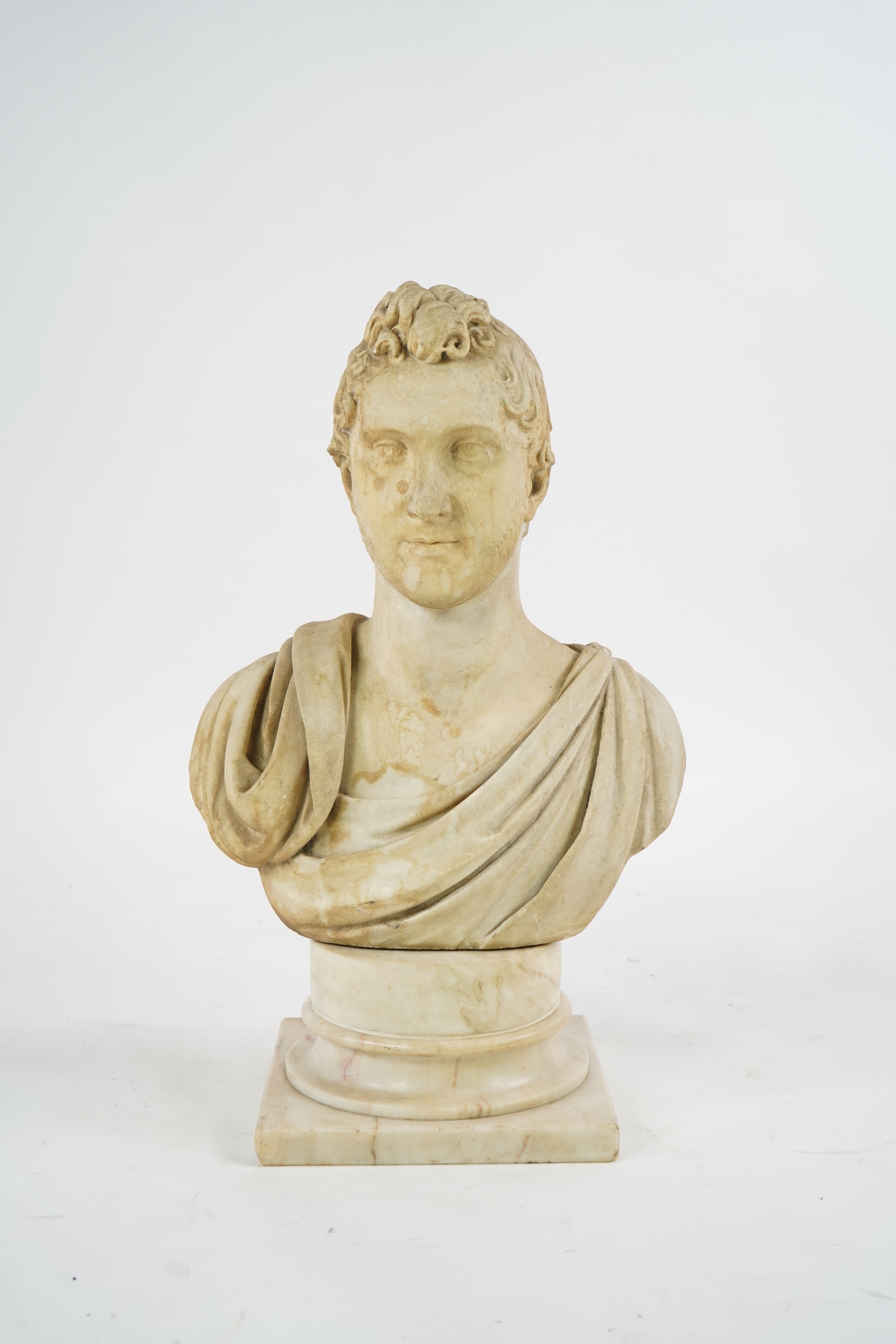 A neoclassical life size marble bust of a gentleman, early 19th century